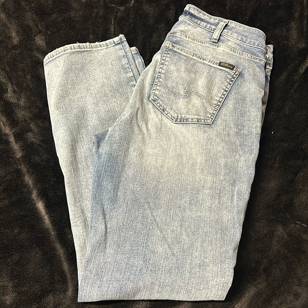 Woman’s silver jeans